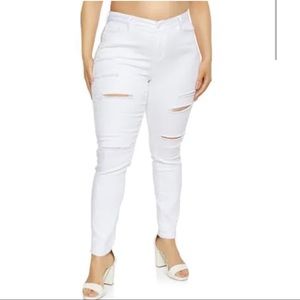 Distressed White skinny jeans